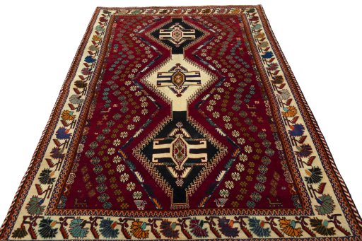 Surface texture of 2000s Shiraz rug with natural Wool and intricate pattern