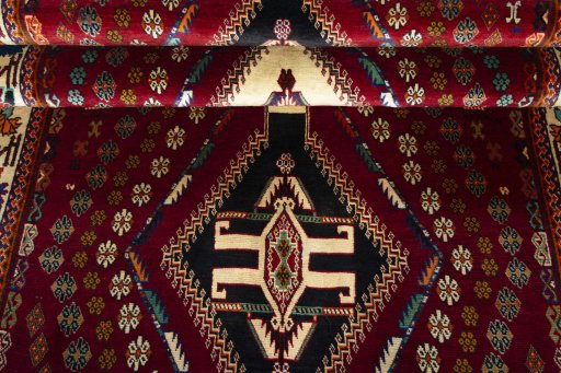 Full view of 2000s Shiraz rug from Iran / Persia, 270 × 160 cm in Red tones