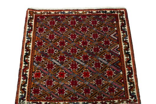 Surface texture of 2000s Shiraz rug with natural Wool and intricate pattern