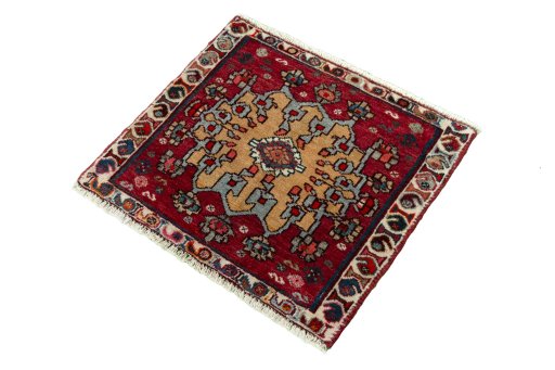 Corner detail of 2000s Shiraz rug showing border pattern and Wool pile