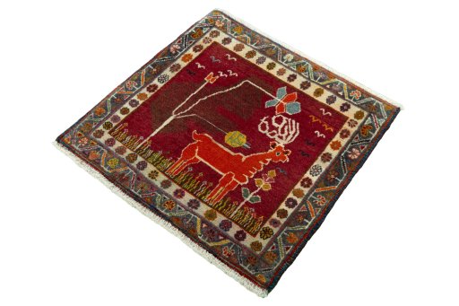 Corner detail of 2000s Shiraz rug showing border pattern and Wool pile
