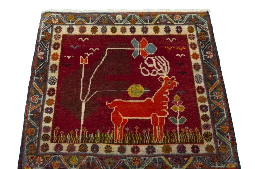 Surface texture of 2000s Shiraz rug with natural Wool and intricate pattern