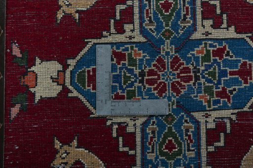 Backside of handmade 2000s Shiraz rug showing knot structure and weave density
