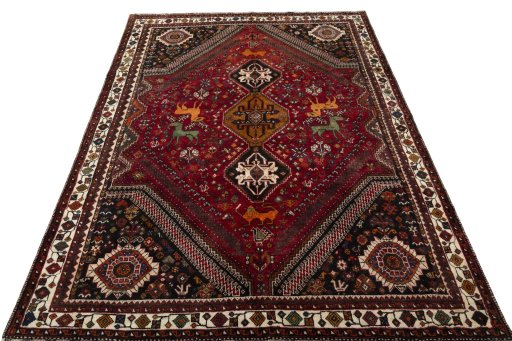 Surface texture of 2000s Shiraz rug with natural Wool and intricate pattern