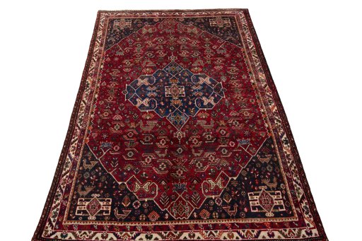 Surface texture of 1970s Shiraz rug with natural Wool and intricate pattern