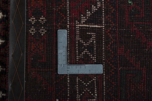 Surface texture of 2000s Shiraz rug with natural Wool and intricate pattern