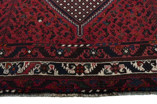 Close-up detail of 2000s Shiraz rug from Iran / Persia showing Wool weave