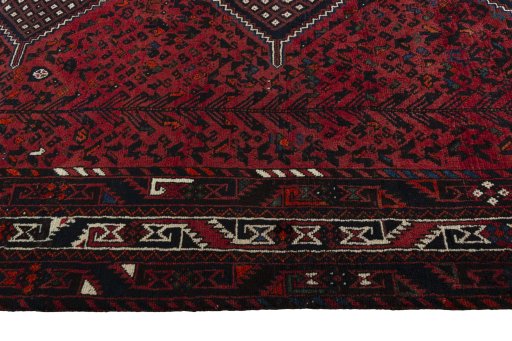Full view of 2000s Shiraz rug from Iran / Persia, 314 × 218 cm in Red tones