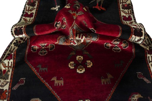 Surface texture of 2000s Shiraz rug with natural Wool and intricate pattern