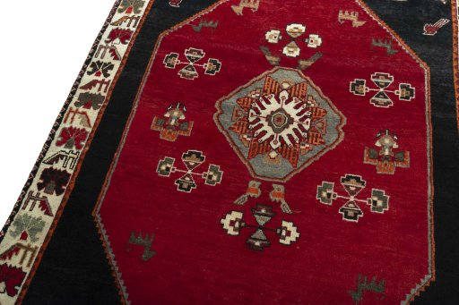 Backside of handmade 2000s Shiraz rug showing knot structure and weave density
