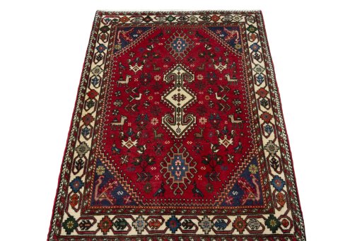 Surface texture of 2000s Shiraz rug with natural Wool and intricate pattern