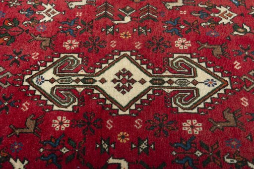 Central medallion detail of 2000s Shiraz rug from Iran / Persia