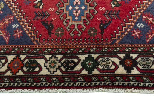 Close-up detail of 2000s Shiraz rug from Iran / Persia showing Wool weave