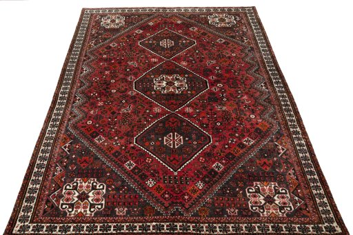 Surface texture of 2000s Shiraz rug with natural Wool and intricate pattern