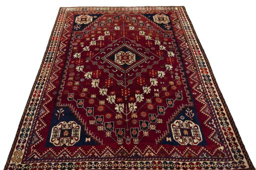 Surface texture of 2000s Shiraz rug with natural Wool and intricate pattern