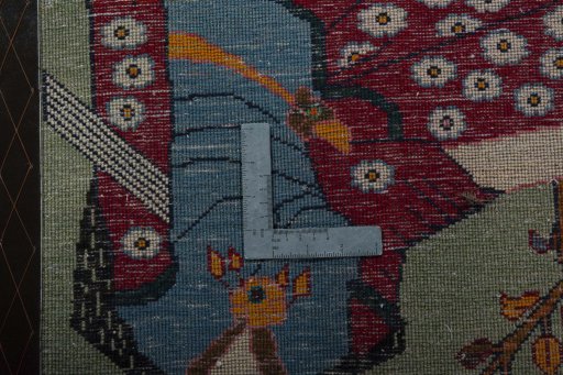 Backside of handmade 2000s Shiraz rug showing knot structure and weave density
