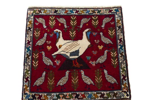 Surface texture of 2000s Shiraz rug with natural Wool and intricate pattern