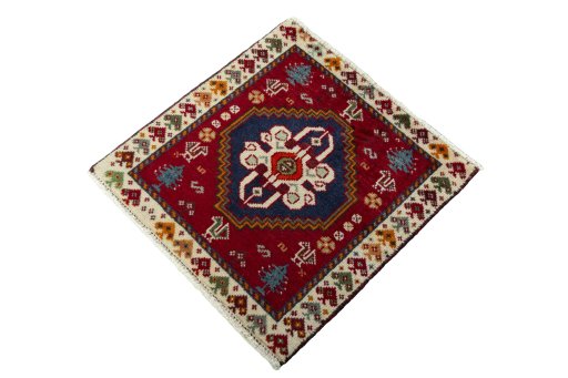 Corner detail of 2000s Shiraz rug showing border pattern and Wool pile