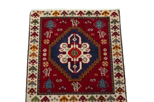 Surface texture of 2000s Shiraz rug with natural Wool and intricate pattern