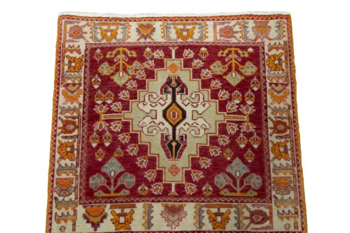 Surface texture of 2000s Shiraz rug with natural Wool and intricate pattern