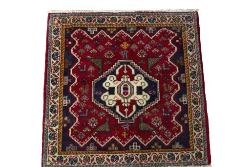 Surface texture of 2000s Shiraz rug with natural Wool and intricate pattern