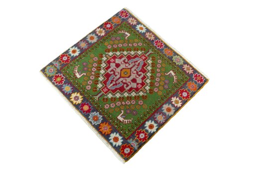 Corner detail of 2000s Shiraz rug showing border pattern and Wool pile