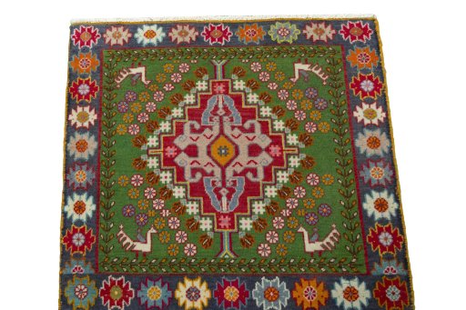 Surface texture of 2000s Shiraz rug with natural Wool and intricate pattern