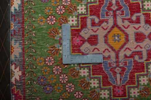 Backside of handmade 2000s Shiraz rug showing knot structure and weave density