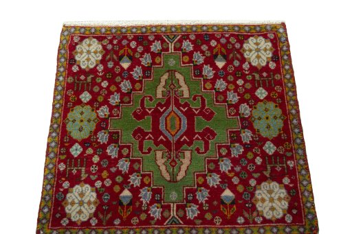 Surface texture of 2000s Shiraz rug with natural Wool and intricate pattern