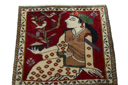 Surface texture of 2000s Shiraz rug with natural Wool and intricate pattern
