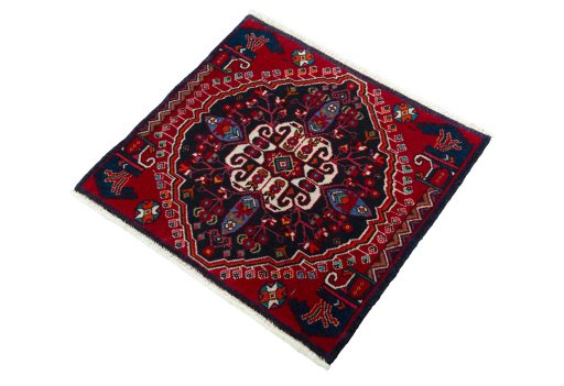 Corner detail of 2000s Shiraz rug showing border pattern and Wool pile