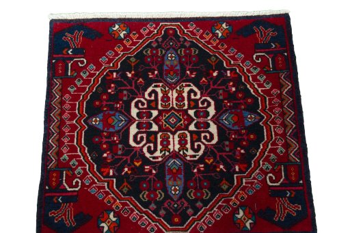 Surface texture of 2000s Shiraz rug with natural Wool and intricate pattern
