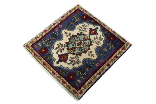Corner detail of 2000s Shiraz rug showing border pattern and Wool pile