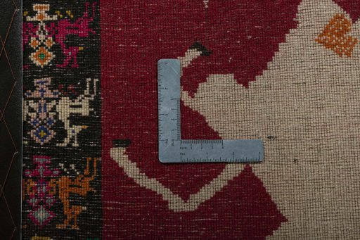 Backside of handmade 2000s Shiraz rug showing knot structure and weave density