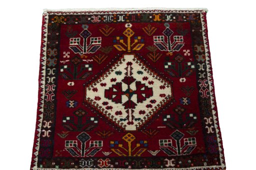 Surface texture of 2000s Shiraz rug with natural Wool and intricate pattern