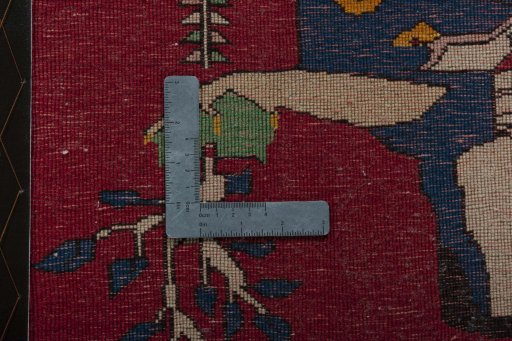 Backside of handmade 2000s Shiraz rug showing knot structure and weave density