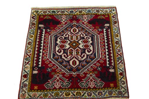 Surface texture of 2000s Shiraz rug with natural Wool and intricate pattern
