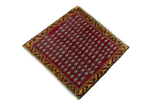 Corner detail of 2000s Shiraz rug showing border pattern and Wool pile