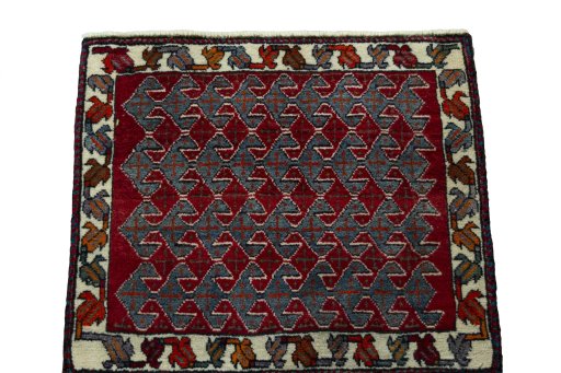 Surface texture of 2000s Shiraz rug with natural Wool and intricate pattern