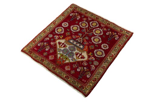 Corner detail of 2000s Shiraz rug showing border pattern and Wool pile
