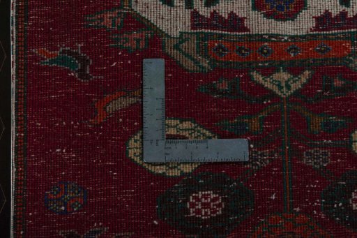 Backside of handmade 2000s Shiraz rug showing knot structure and weave density