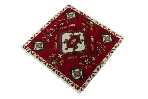 Corner detail of 2000s Shiraz rug showing border pattern and Wool pile