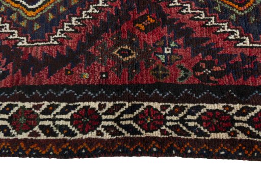 Close-up detail of 2000s Shiraz rug from Iran / Persia showing Wool weave