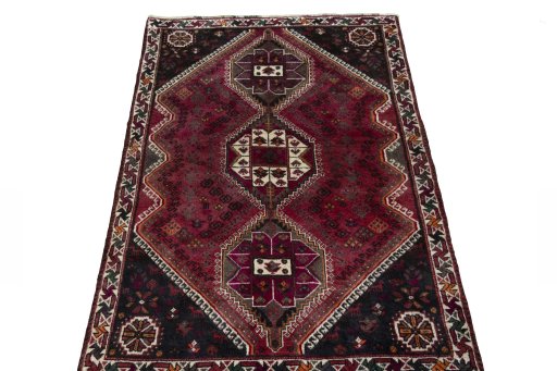 Surface texture of 2000s Shiraz rug with natural Wool and intricate pattern