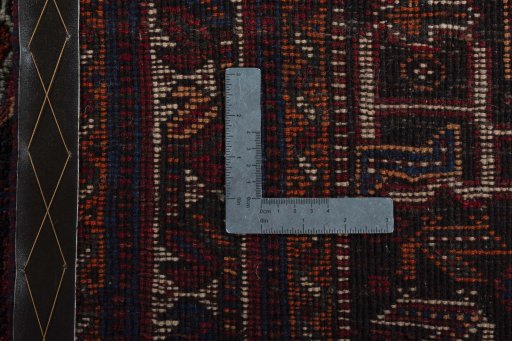 Surface texture of 2000s Shiraz rug with natural Wool and intricate pattern