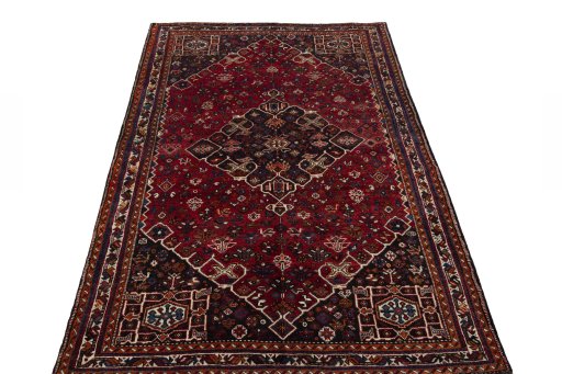 Surface texture of 2000s Shiraz rug with natural Wool and intricate pattern
