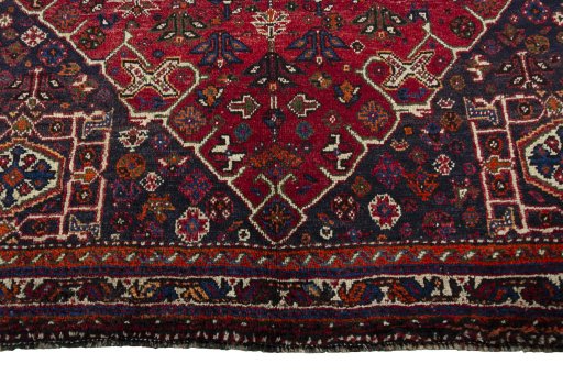 Close-up detail of 2000s Shiraz rug from Iran / Persia showing Wool weave