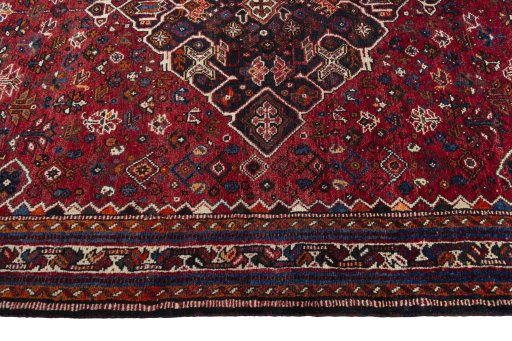 Full view of 2000s Shiraz rug from Iran / Persia, 264 × 173 cm in Red tones