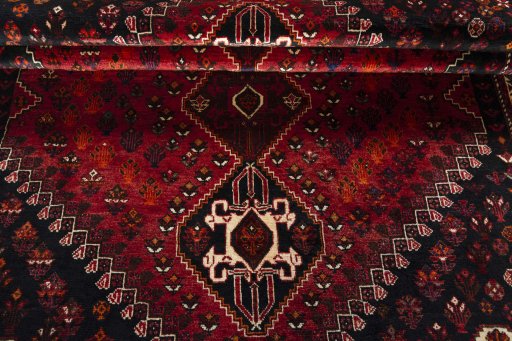 Close-up detail of 2000s Shiraz rug from Iran / Persia showing Wool weave