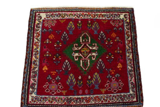 Surface texture of 2000s Shiraz rug with natural Wool and intricate pattern